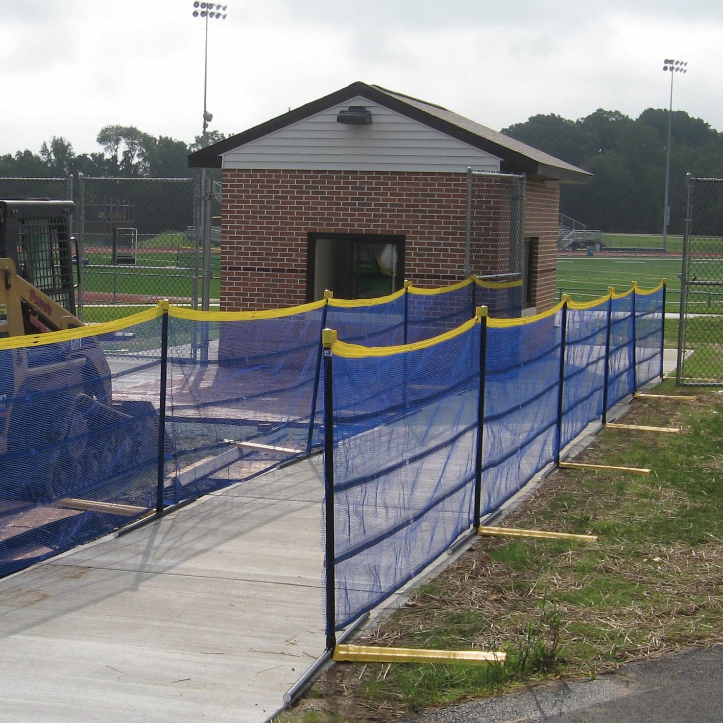 Above-ground fence on concrete